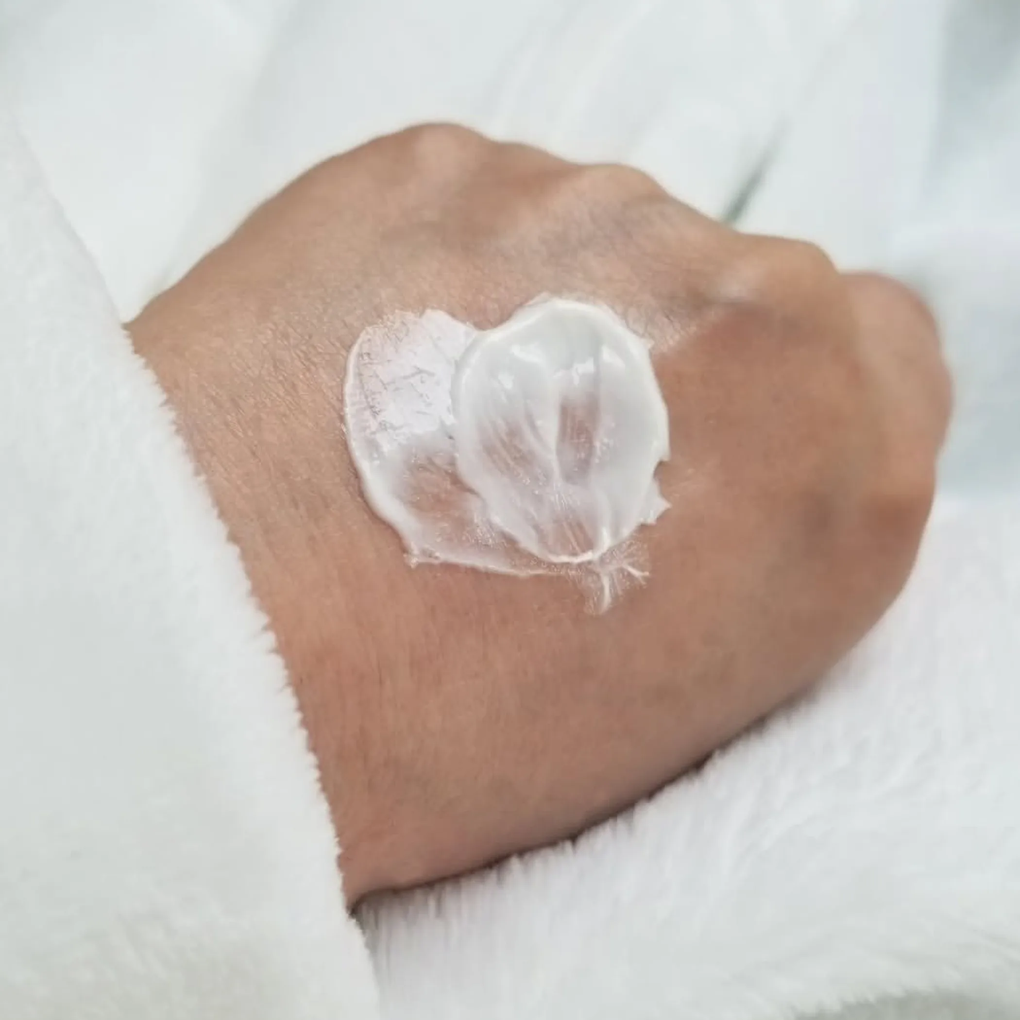 woman receiving facial skincare treatment