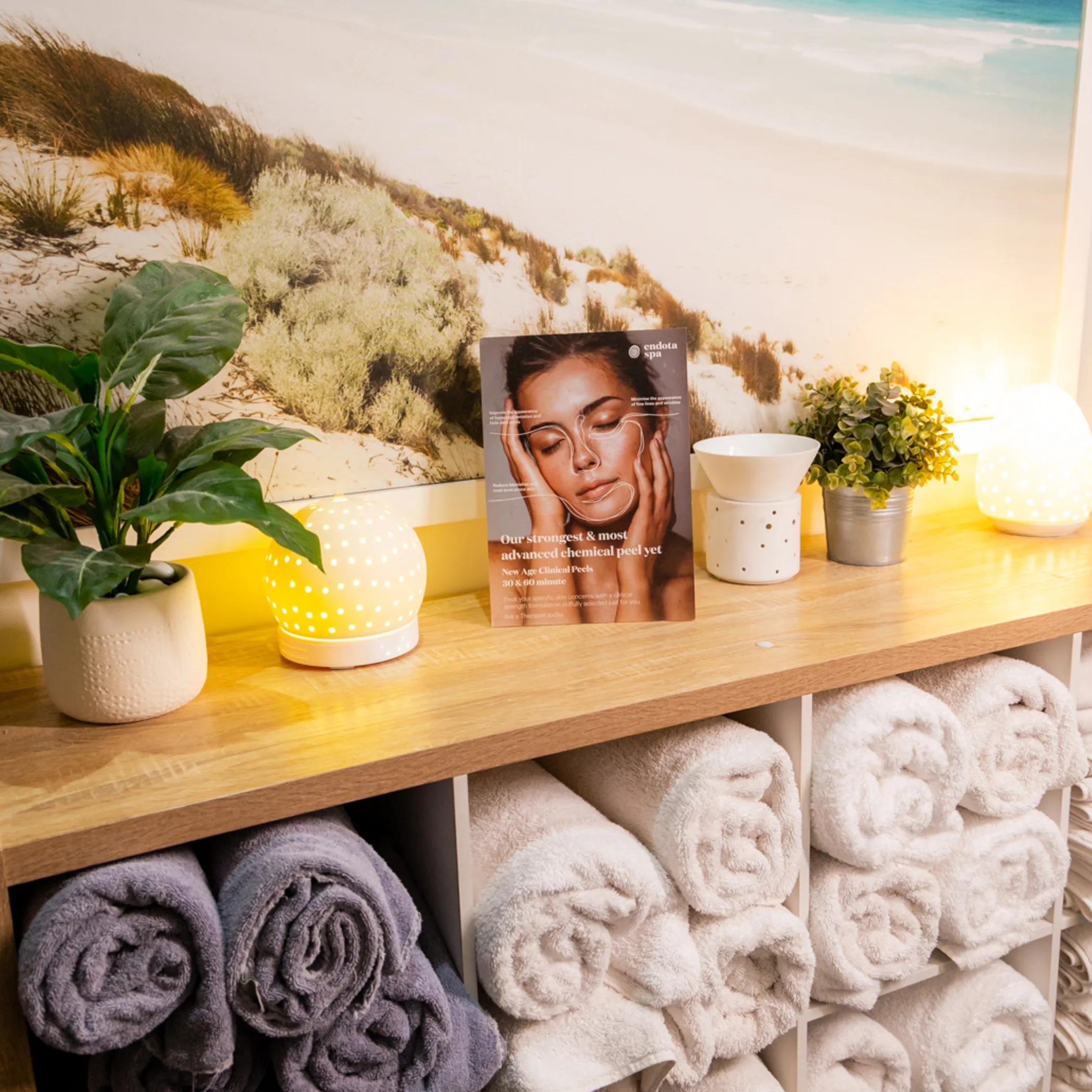 spa setting with towels and brochure